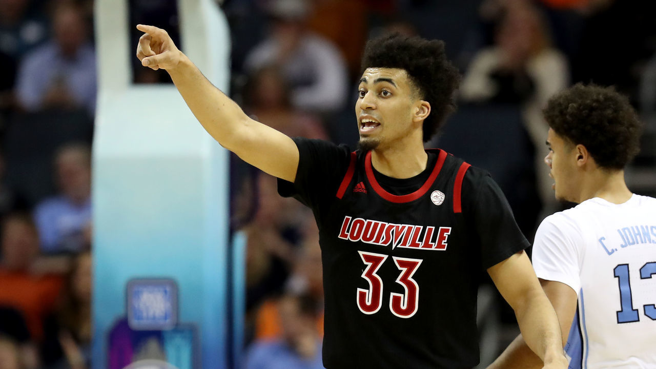 CHARLOTTE, NORTH CAROLINA - MARCH 14: Jordan Nwora #33 of the Louisville Cardinals reacts after a play against the North Carolina Tar Heels during their game in the quarterfinal round of the 2019 Men's ACC Basketball Tournament at Spectrum Center on March 14, 2019 in Charlotte, North Carolina.