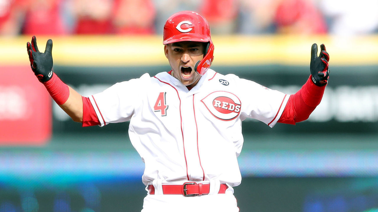 CINCINNATI, OH - MARCH 28: José Iglesias #4 of the Cincinnati Reds reacts to hitting a RBI double in the second inning during a game between the Pittsburgh Pirates and the Cincinnati Reds at Great American Ball Park on Thursday, March 28, 2019 in Cincinnati, Ohio.