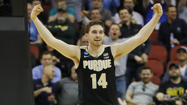 LOUISVILLE, KENTUCKY - MARCH 28: Ryan Cline #14 of the Purdue Boilermakers reacts after a three pointer against the Tennessee Volunteers during the second half of the 2019 NCAA Men's Basketball Tournament South Regional at the KFC YUM! Center on March 28, 2019 in Louisville, Kentucky.