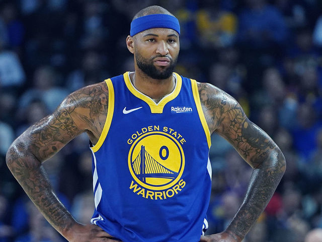 OAKLAND, CA - MARCH 05: DeMarcus Cousins #0 of the Golden State Warriors looks on against the Boston Celtics during an NBA basketball game at ORACLE Arena on March 5, 2019 in Oakland, California.