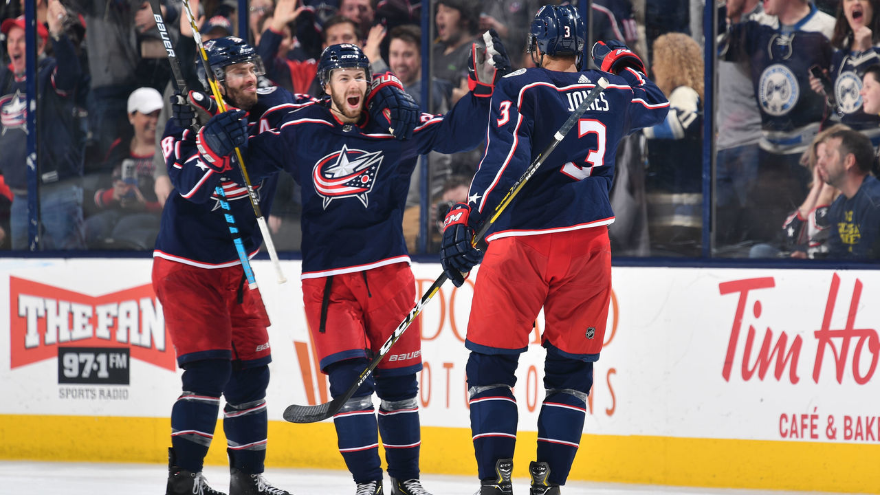 COLUMBUS, OH - MARCH 28: Oliver Bjorkstrand #28 of the Columbus Blue Jackets celebrates his second period goal with teammates Boone Jenner #38 and Seth Jones #3 of the Columbus Blue Jackets during a game against the Montreal Canadiens on March 28, 2019 at Nationwide Arena in Columbus, Ohio.