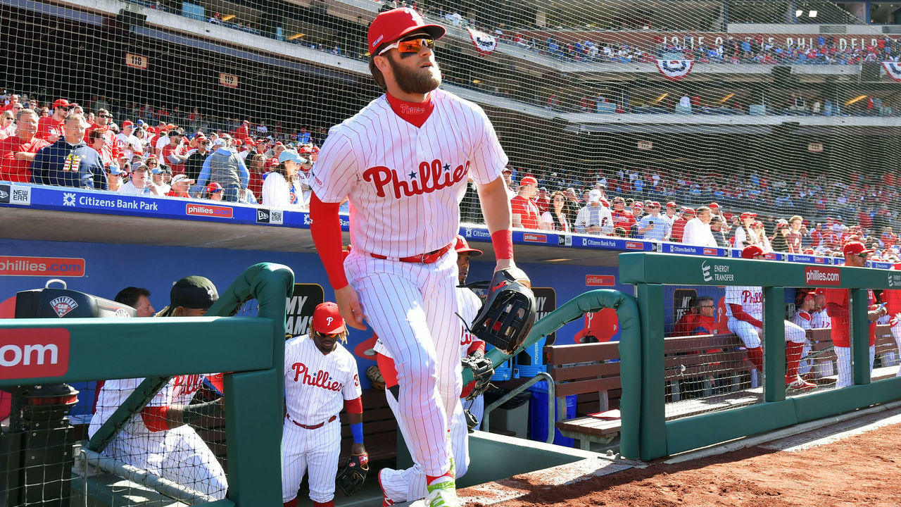 PHILADELPHIA, PA - MARCH 28: Bryce Harper #3 of the Philadelphia Phillies runs onto the field before the game against the Atlanta Braves on Opening Day at Citizens Bank Park on March 28, 2019 in Philadelphia, Pennsylvania.