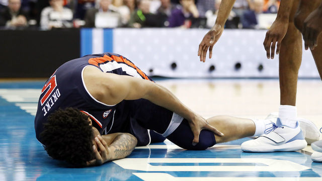 KANSAS CITY, MISSOURI - MARCH 29: Chuma Okeke #5 of the Auburn Tigers reacts after suffering an injury against the North Carolina Tar Heels during the 2019 NCAA Basketball Tournament Midwest Regional at Sprint Center on March 29, 2019 in Kansas City, Missouri.
