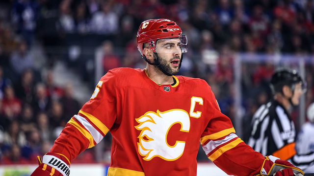 CALGARY, AB - MARCH 04: Calgary Flames Defenceman Mark Giordano (5) looks to the bench during the first period of an NHL game where the Calgary Flames hosted the Toronto Maple Leafs on March 4, 2019, at the Scotiabank Saddledome in Calgary, AB.