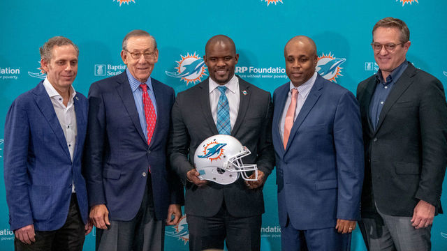 DAVIE, FL - FEBRUARY 04: (L-R) Bruce Beal Vice Chairman, Stephen Ross Chairman & Owner, Brian Flores Head Coach, Chris Grier General Manager, and Tom Garfinkel Vice Chairman and CEO of the Miami Dolphins, pose as the Miami Dolphins announce Brian Flores as their new Head Coach at Baptist Health Training Facility at Nova Southern University on February 4, 2019 in Davie, Florida.