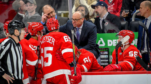 DETROIT, MI - MARCH 16: Detroit Red Wings head coach Jeff Blashill talks to his team during a timeout during the Detroit Red Wings game versus the New York Islanders on March 16, 2019, at Little Caesars Arena in Detroit, Michigan.