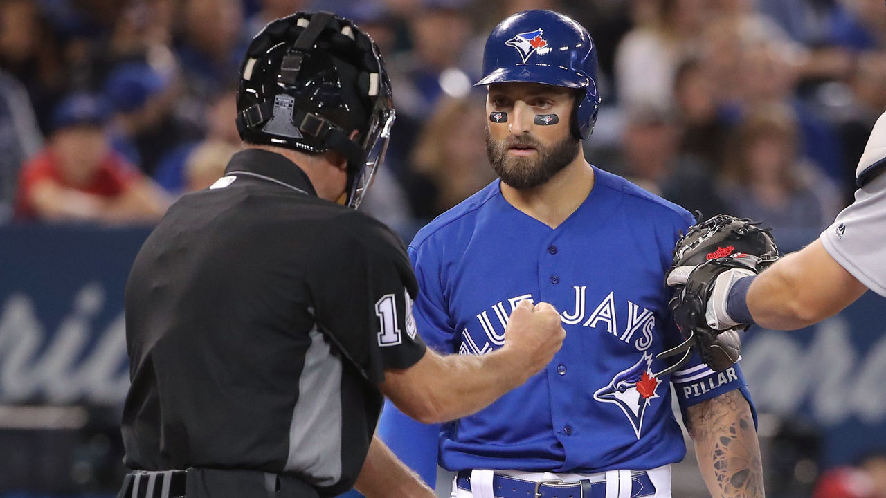 TORONTO, ON - MARCH 30: Kevin Pillar #11 of the Toronto Blue Jays is called out on a groundout by home plate umpire Ed Hickox #15 as Pillar argues that the ball hit his body in the sixth inning during MLB game action as Grayson Greiner #17 of the Detroit Tigers applies the tag at Rogers Centre on March 30, 2019 in Toronto, Canada.