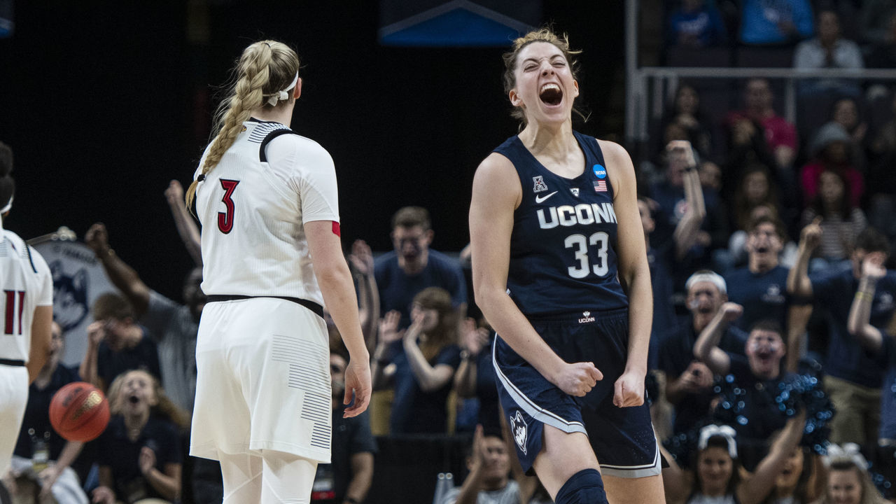 ALBANY, NY - MARCH 31: Connecticut Huskies Guard / Forward Katie Lou Samuelson (33) reacts to hitting a three point shot during the second half of the game between the Connecticut Huskies and the Louisville Cardinals on March 31, 2019, at the Times Union Center in Albany NY.