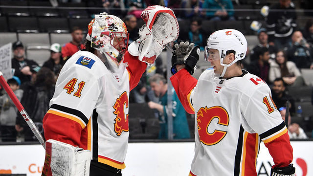 SAN JOSE, CA - MARCH 31: Mike Smith #41 and Derek Ryan #10 of the Calgary Flames celebrate the win over the San Jose Sharks at SAP Center on March 31, 2019 in San Jose, California