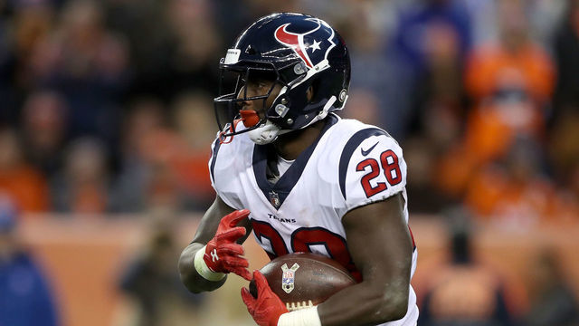 DENVER, CO - NOVEMBER 04: Alfred Blue #28 of the Houston Texans carries the ball against the Denver Broncos at Broncos Stadium at Mile High on November 4, 2018 in Denver, Colorado.