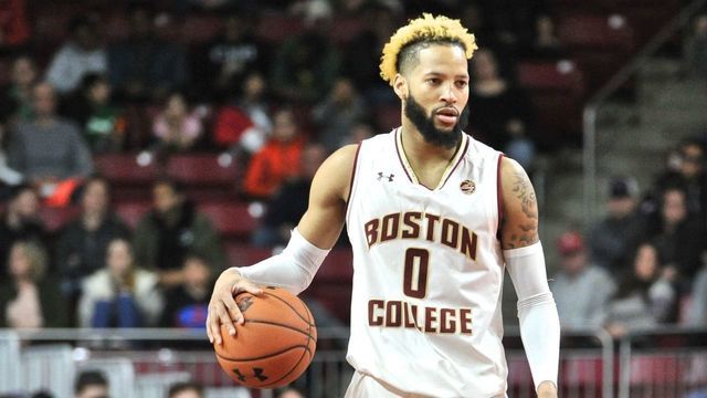 CHESTNUT HILL, MA - MARCH 09: Boston College Eagles guard Ky Bowman (0) brings the ball up court past North Carolina State Wolfpack guard Devon Daniels (24). During the Boston College Eagles game against the North Carolina State Wolfpack on March 09, 2019 at Conte Forum in Chestnut Hill, MA.
