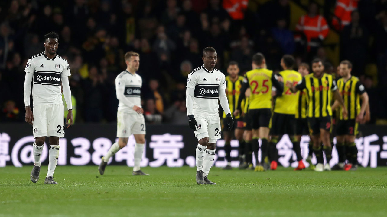 WATFORD, ENGLAND - APRIL 02: Andre-Frank Zambo Anguissa and Jean Michael Seri of Fulham look dejected after their team concede during the Premier League match between Watford FC and Fulham FC at Vicarage Road on April 02, 2019 in Watford, United Kingdom.