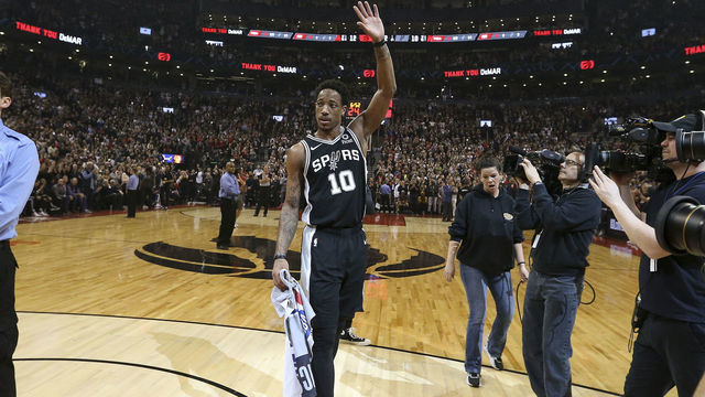TORONTO, ON - February 22: In first half action, San Antonio Spurs guard DeMar DeRozan (10) acknowledges the crowd following a video tribute. The Toronto Raptors took on the San Antonio Spurs in NBA basketball action at the Scotiabank arena in Toronto. The game marks the first time former Raptor star DeMar DeRozan was back playing in Toronto since his trade. (Richard Lautens/Toronto Star via Getty Images)