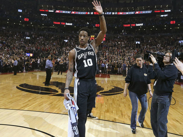 TORONTO, ON - February 22: In first half action, San Antonio Spurs guard DeMar DeRozan (10) acknowledges the crowd following a video tribute. The Toronto Raptors took on the San Antonio Spurs in NBA basketball action at the Scotiabank arena in Toronto. The game marks the first time former Raptor star DeMar DeRozan was back playing in Toronto since his trade. (Richard Lautens/Toronto Star via Getty Images)