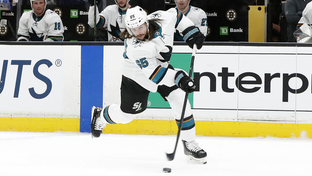 BOSTON, MA - FEBRUARY 26: San Jose Sharks defenseman Erik Karlsson (65) shoots during a game between the Boston Bruins and the San Jose Sharks on February 26, 2019, at TD Garden in Boston, Massachusetts.