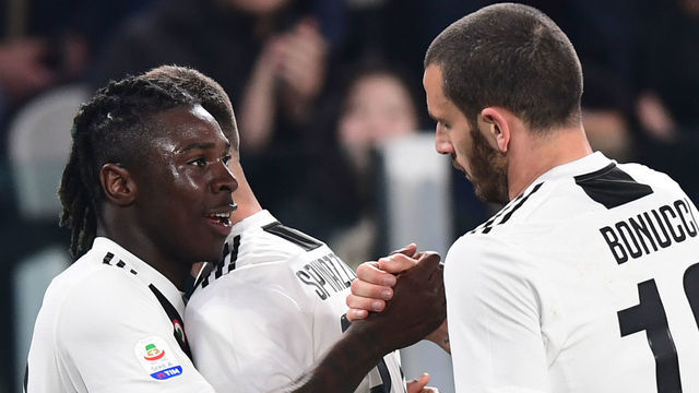 Juventus' Italian forward Moise Kean (L) celebrates with Juventus' Italian defender Leonardo Bonucci after scoring twice during the Italian Serie A football match Juventus vs Udinese on March 8, 2019 at the Juventus Allianz stadium in Turin.