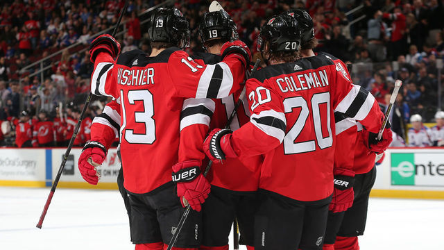 NEWARK, NJ - APRIL 01: Members of the New Jersey Devils celebrate a first period goal by Travis Zajac #19 against the New York Rangers at the Prudential Center on April 1, 2019 in Newark, New Jersey.