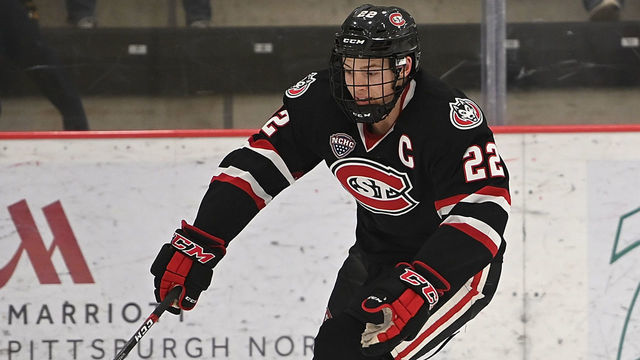 CRANBERRY TOWNSHIP, PA - JANUARY 04: Jimmy Schuldt #22 of the St. Cloud State Huskies controls the puck against Greg Campbell #20 of the Union Dutchmen in the third period during the game at UPMC Lemieux Sports Complex on January 4, 2019 in Cranberry Township, Pennsylvania.