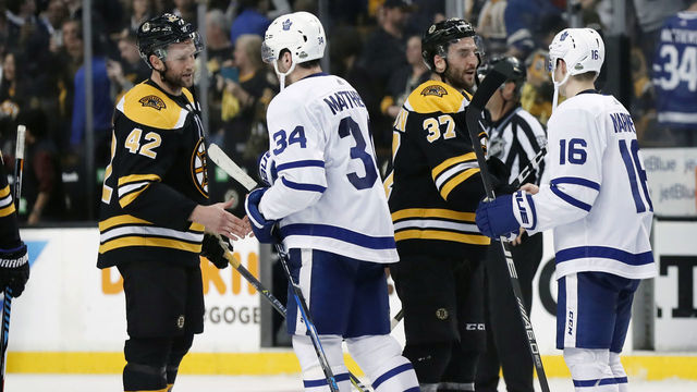BOSTON, MA - APRIL 25: Boston Bruins center David Backes (42) and Boston Bruins center Patrice Bergeron (37) shake hands with Toronto Maple Leafs center Auston Matthews (34) and Toronto Maple Leafs right wing Mitchell Marner (16) during Game 7 of the First Round for the 2018 Stanley Cup Playoffs between the Boston Bruins and the Toronto Maple Leafs on April 25, 2018, at TD Garden in Boston, Massachusetts. The Bruins defeated the Maple Leafs 7-4 to advance to the next round.
