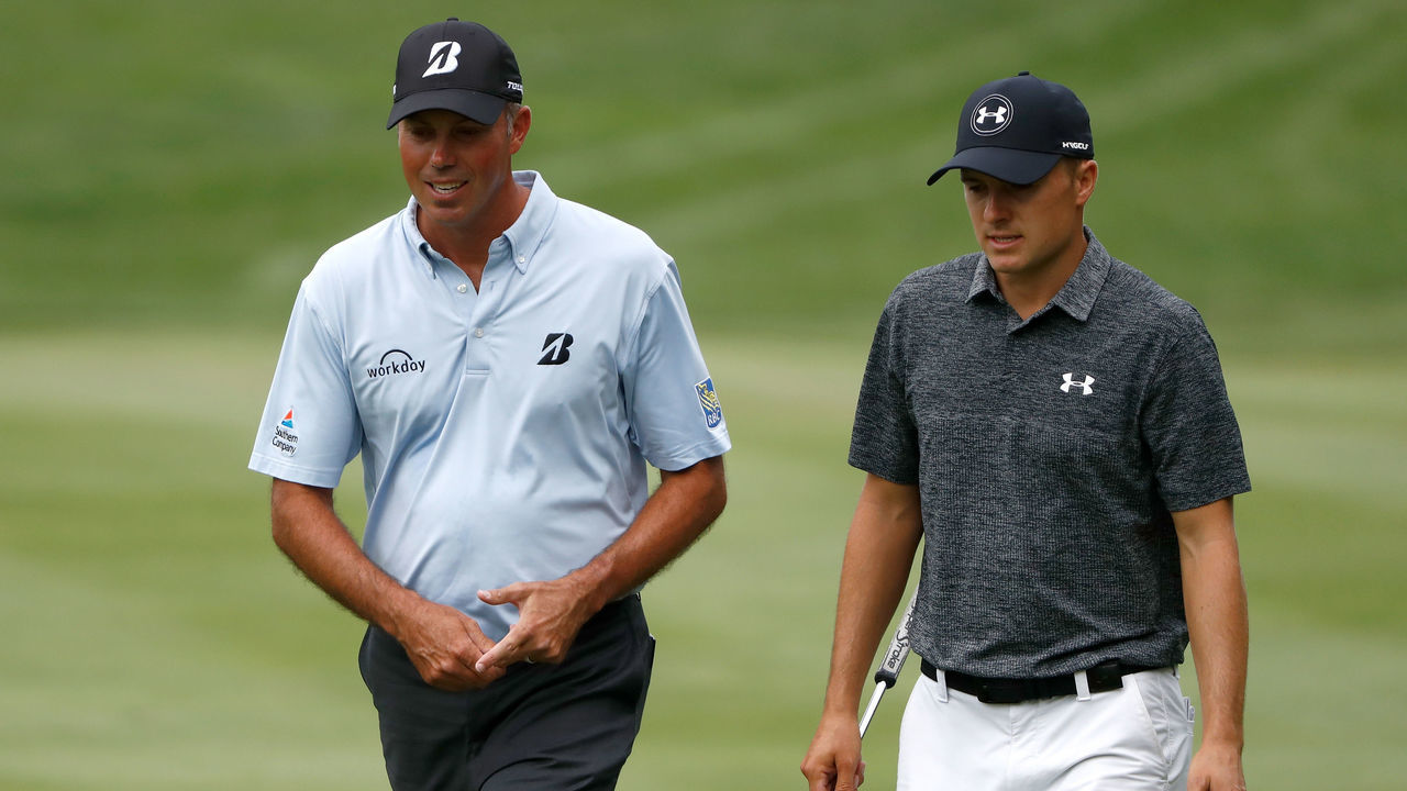 AKRON, OH - AUGUST 06: Matt Kuchar and Jordan Spieth walk up the fairway during the final round of the World Golf Championships - Bridgestone Invitational at Firestone Country Club South Course on August 6, 2017 in Akron, Ohio.