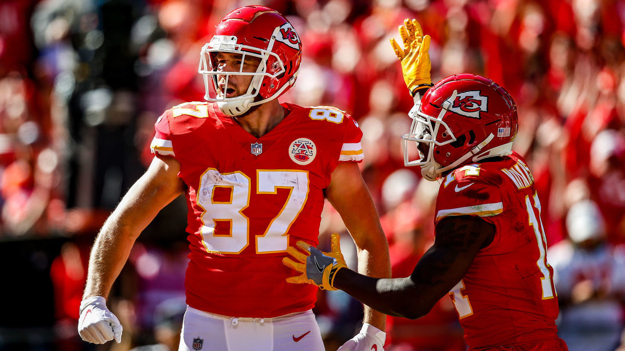 KANSAS CITY, MO - OCTOBER 28: Sammy Watkins #14 of the Kansas City Chiefs congratulates teammate Travis Kelce #87 after Kelce caught the Chiefs first touchdown of the game during the second quarter against the Denver Broncos at Arrowhead Stadium on October 28, 2018 in Kansas City, Missouri.