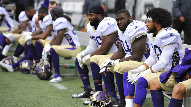 BIRMINGHAM, ALABAMA - MARCH 31: Freddie Burden #64 of the Atlanta Legends sits on the bench during the first half of the Alliance of American Football game against the Birmingham Iron at Legion Field on March 31, 2019 in Birmingham, Alabama.