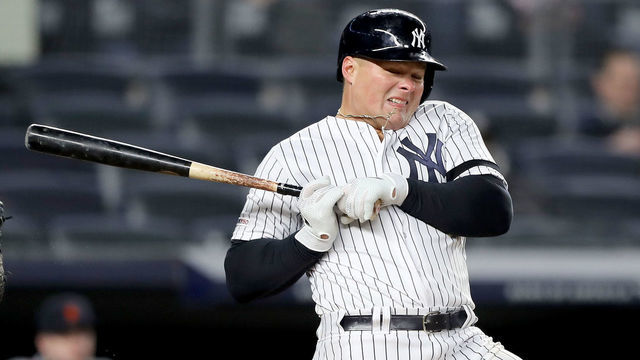 NEW YORK, NEW YORK - APRIL 02: Luke Voit #45 of the New York Yankees reacts after he is hit by a pitch in the eighth inning against the Detroit Tigers at Yankee Stadium on April 02, 2019 in the Bronx borough of New York City.