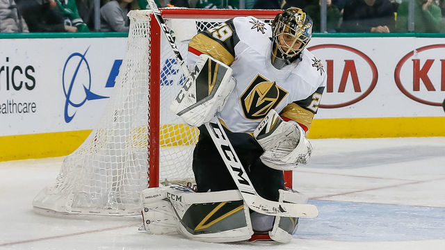 DALLAS, TX - MARCH 15: Vegas Golden Knights goaltender Marc-Andre Fleury (29) blocks a shot during the game between the Dallas Stars and the Vegas Golden Knights on March 15, at the American Airlines Center in Dallas, Texas.