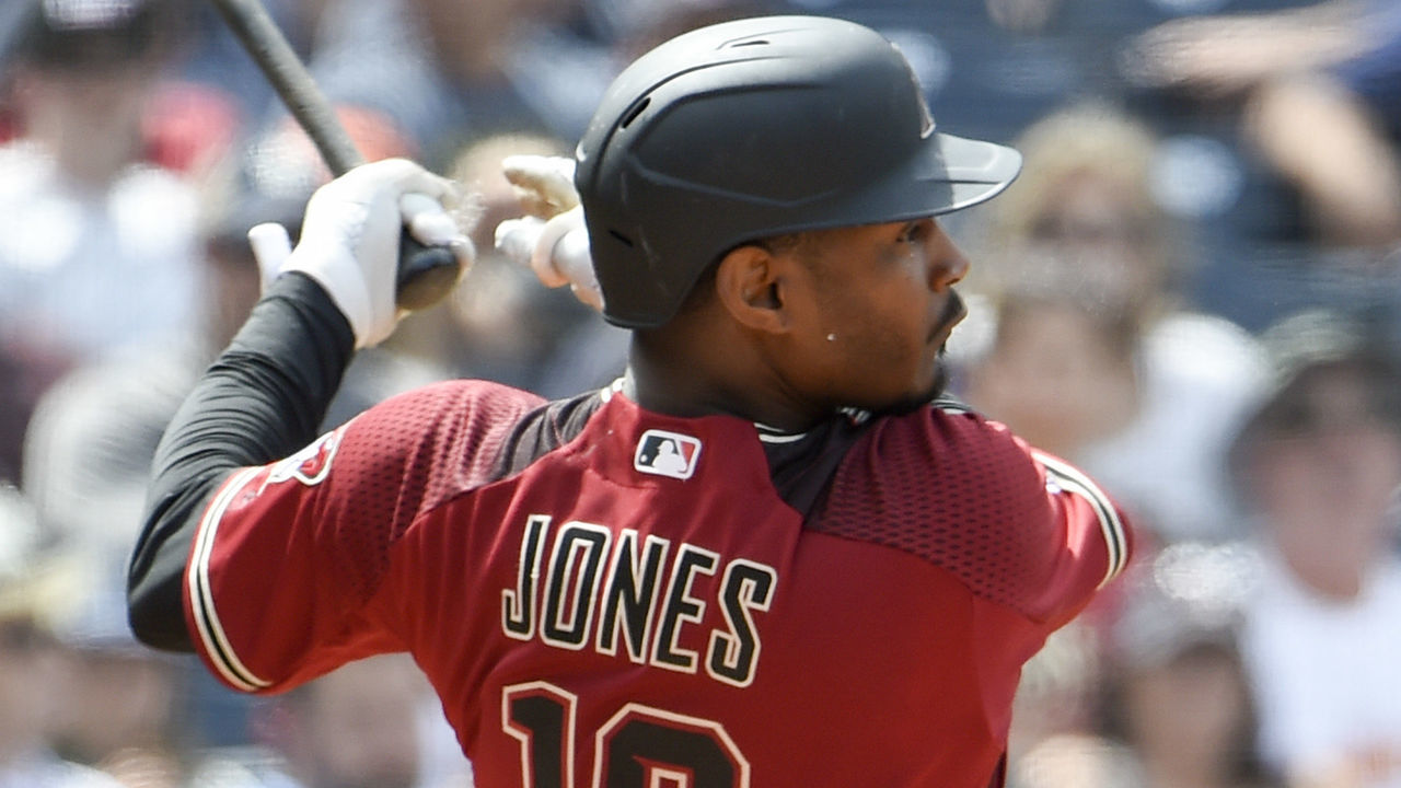 SAN DIEGO, CA - APRIL 3: Adam Jones #10 of the Arizona Diamondbacks hits a double during the fifth inning of a baseball game against the San Diego Padres at Petco Park April 3, 2019 in San Diego, California.