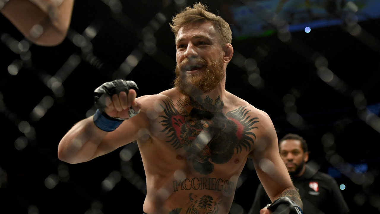 LAS VEGAS, CA - OCTOBER 06: Conor McGregor smiles at Khabib Nurmagomedov during the first round of their match at UFC 229 at the T-Mobile Arena in Las Vegas, Nev. Friday, Oct. 6, 2018.