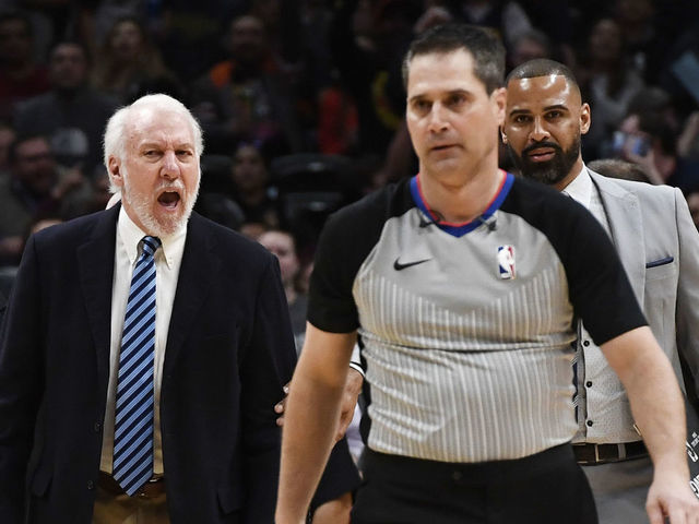 DENVER, CO - APRIL 03: San Antonio Spurs head coach Gregg Popovich yells at referee David Guthrie after Guthrie threw him out of the game in the first few minutes against the Denver Nuggets at the Pepsi Center April 03, 2019.