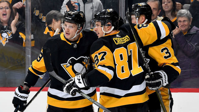 PITTSBURGH, PA - APRIL 04: Jake Guentzel #59 of the Pittsburgh Penguins celebrates his first period goal against the Detroit Red Wings at PPG Paints Arena on April 4, 2019 in Pittsburgh, Pennsylvania.
