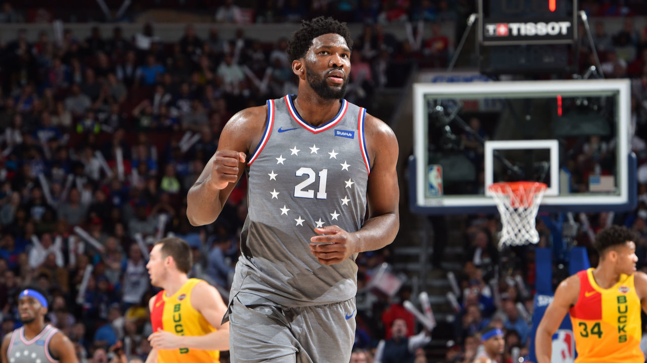 PHILADELPHIA, PA - APRIL 4: Joel Embiid #21 of the Philadelphia 76ers reacts during a game against the Milwaukee Bucks on April 4, 2019 at the Wells Fargo Center in Philadelphia, Pennsylvania NOTE TO USER: User expressly acknowledges and agrees that, by downloading and/or using this Photograph, user is consenting to the terms and conditions of the Getty Images License Agreement. Mandatory Copyright Notice: Copyright 2019 NBAE