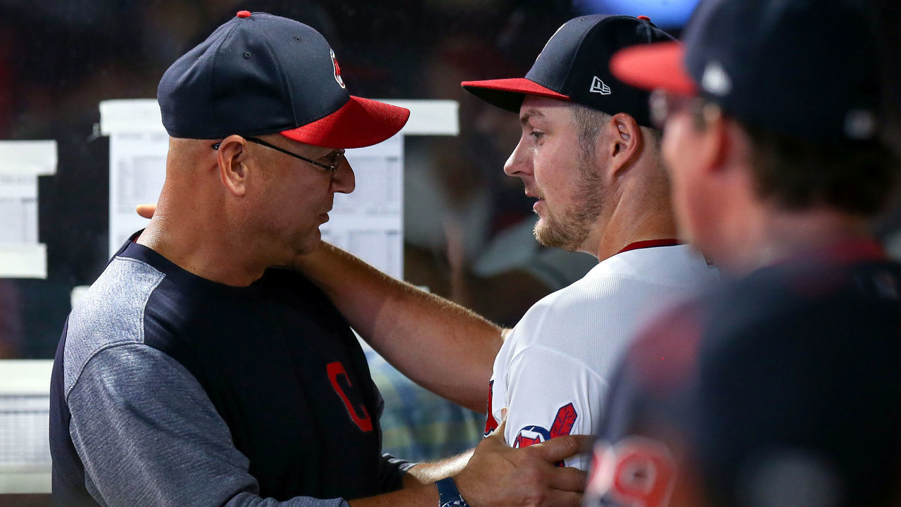 CLEVELAND, OH - AUGUST 06: Cleveland Indians manager Terry Francona (77) congratulates Cleveland Indians starting pitcher Trevor Bauer (47) after Bauer was finished for the night following the sixth inning of the Major League Baseball game between the Minnesota Twins and Cleveland Indians on August 6, 2018, at Progressive Field in Cleveland, OH.