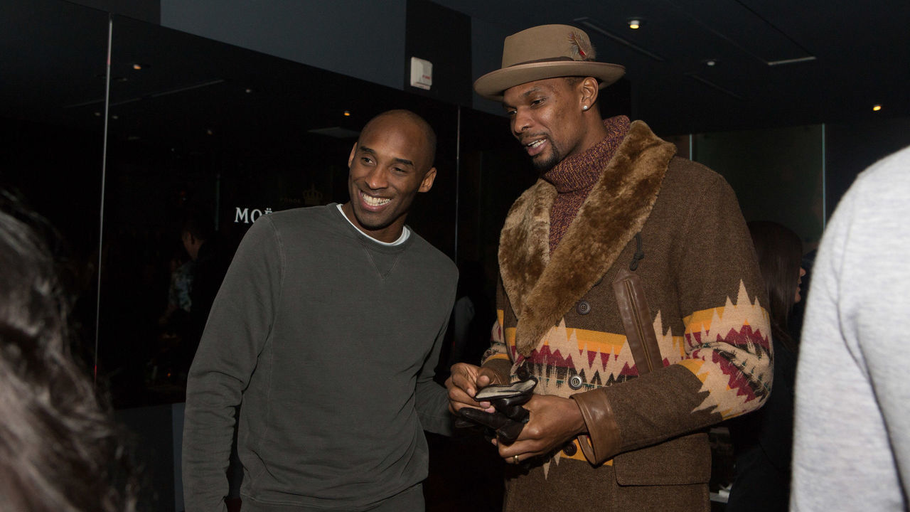 TORONTO, CANADA - FEBRUARY 13: Kobe Bryant and Chris Bosh have a conversation at The Gentleman's Supper Club hosted by Chris Paul, Dwyane Wade and Carmelo Anthony honoring Kobe Bryant on February 13, 2016 in Toronto, Canada.