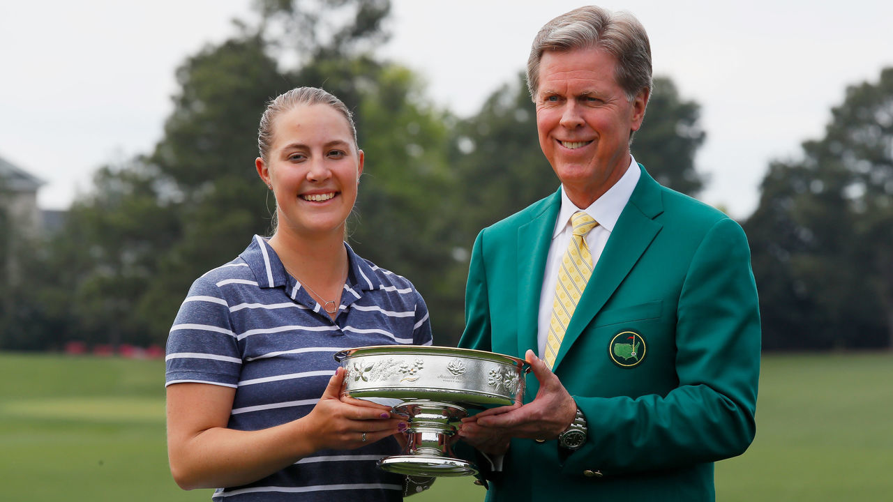 AUGUSTA, GEORGIA - APRIL 06: Jennifer Kupcho of the United States celebrates with Chairman of Augusta National Golf Club and the Masters Tournament Fred Ridley and the trophy after winning the Augusta National Women's Amateur at Augusta National Golf Club on April 06, 2019 in Augusta, Georgia.