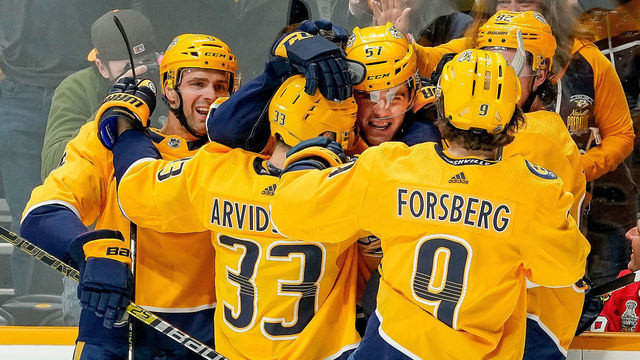 NASHVILLE, TN - APRIL 6: Dante Fabbro #57 of the Nashville Predators celebrates his first NHL goal with teammates against the Chicago Blackhawks at Bridgestone Arena on April 6, 2019 in Nashville, Tennessee.