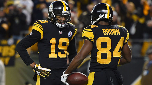 PITTSBURGH, PA - DECEMBER 16: Antonio Brown #84 of the Pittsburgh Steelers celebrates with JuJu Smith-Schuster #19 after a 17 yard touchdown reception in the first quarter during the game against the New England Patriots at Heinz Field on December 16, 2018 in Pittsburgh, Pennsylvania.