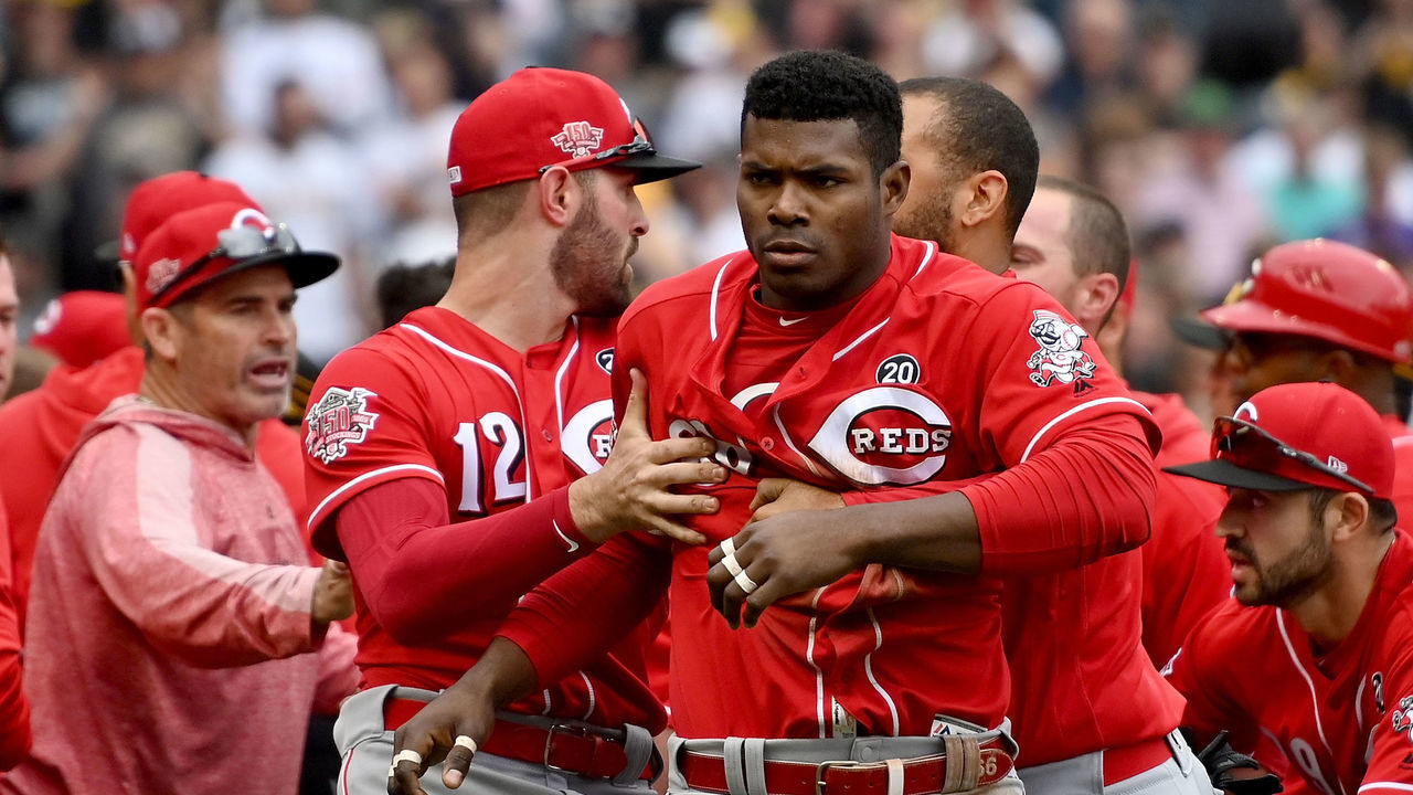 PITTSBURGH, PA - APRIL 07: Yasiel Puig #66 of the Cincinnati Reds is restrained by Matt Kemp #27 after benches clear in the fourth inning during the game against the Pittsburgh Pirates at PNC Park on April 7, 2019 in Pittsburgh, Pennsylvania.