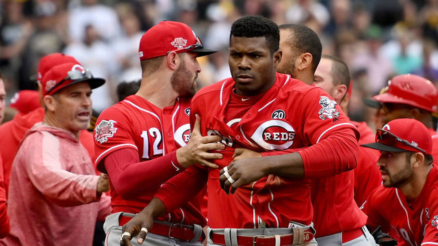 PITTSBURGH, PA - APRIL 07: Yasiel Puig #66 of the Cincinnati Reds is restrained by Matt Kemp #27 after benches clear in the fourth inning during the game against the Pittsburgh Pirates at PNC Park on April 7, 2019 in Pittsburgh, Pennsylvania.