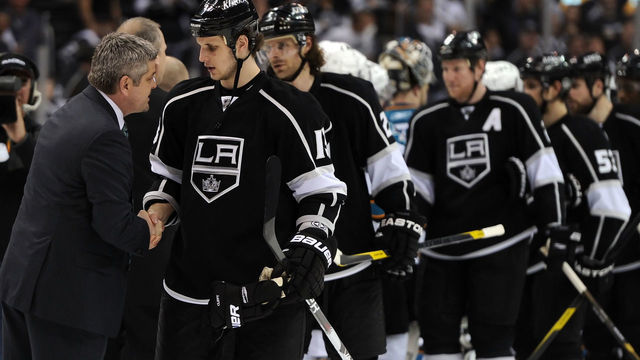 LOS ANGELES, CA - APRIL 25: Todd McLellan of the San Jose Sharks shakes hands with Kyle Clifford #13 of the Los Angeles Kings after the Sharks eliminated the Kings in game six of the Western Conference Quarterfinals during the 2011 NHL Stanley Cup Playoffs at Staples Center on April 25, 2011 in Los Angeles, California.