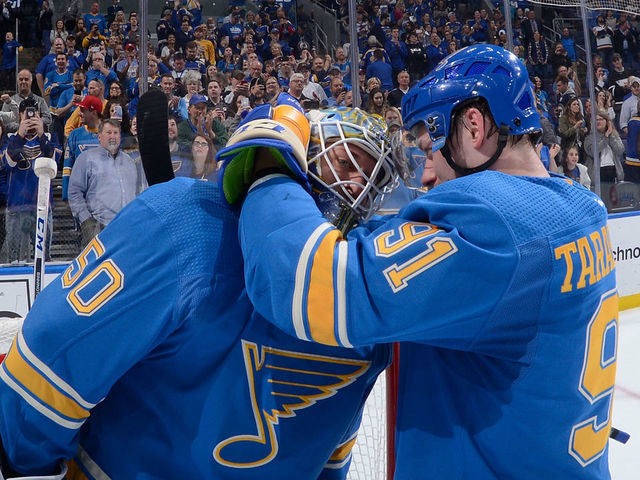 ST. LOUIS, MO - APRIL 6: Vladimir Tarasenko #91 of the St. Louis Blues congratulates Jordan Binnington #50 of the St. Louis Blues after beating the Vancouver Canucks in a shoot out 3-2 at Enterprise Center on April 6, 2019 in St. Louis, Missouri.