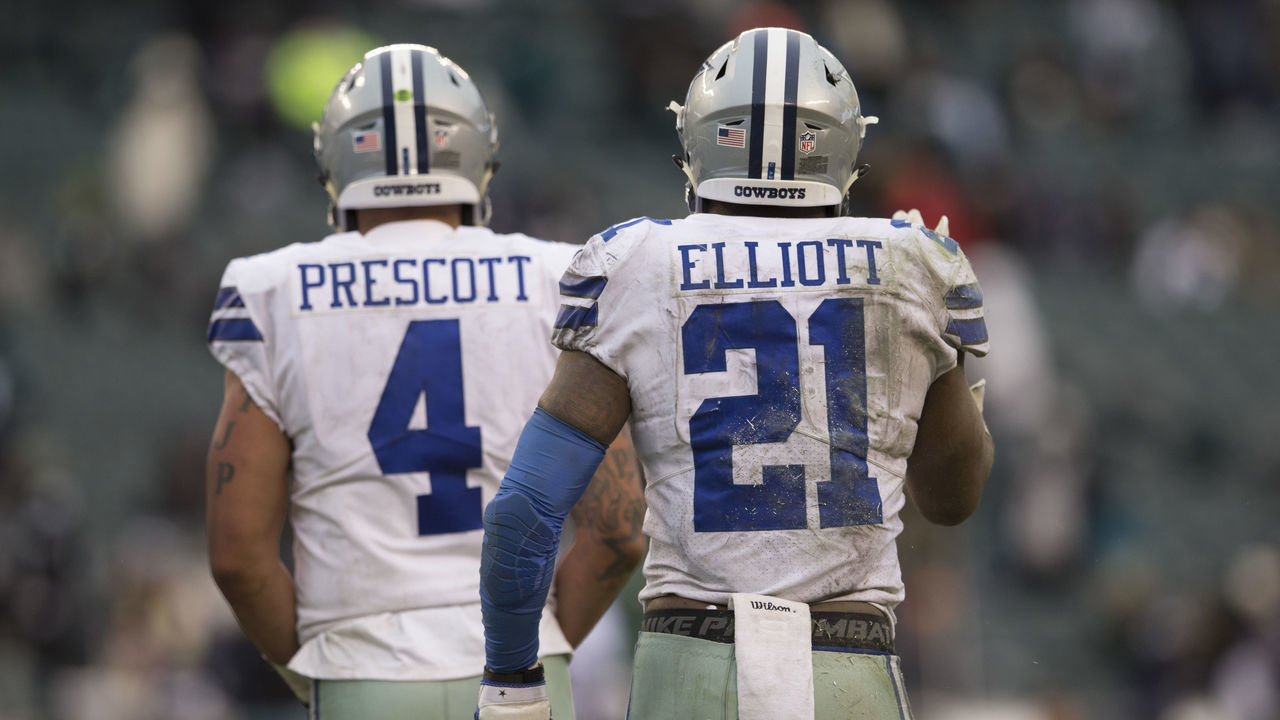 PHILADELPHIA, PA - DECEMBER 31: Dak Prescott #4 and Ezekiel Elliott #21 of the Dallas Cowboys look on against the Philadelphia Eagles at Lincoln Financial Field on December 31, 2017 in Philadelphia, Pennsylvania.
