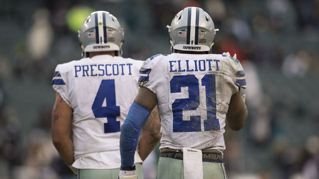 PHILADELPHIA, PA - DECEMBER 31: Dak Prescott #4 and Ezekiel Elliott #21 of the Dallas Cowboys look on against the Philadelphia Eagles at Lincoln Financial Field on December 31, 2017 in Philadelphia, Pennsylvania.