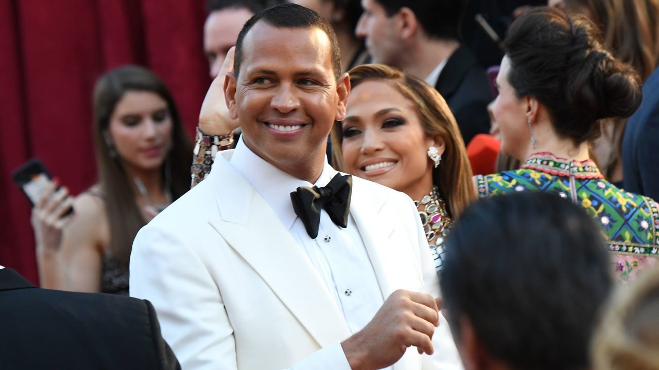 US singer and actress Jennifer Lopez (R) and husband baseball player Alex Rodriguez arrive for the 91st Annual Academy Awards at the Dolby Theatre in Hollywood, California on February 24, 2019.