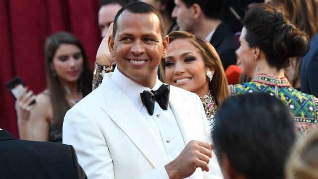 US singer and actress Jennifer Lopez (R) and husband baseball player Alex Rodriguez arrive for the 91st Annual Academy Awards at the Dolby Theatre in Hollywood, California on February 24, 2019.