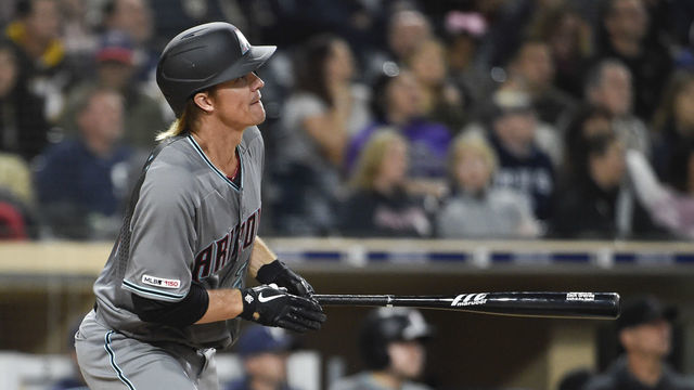 SAN DIEGO, CA - APRIL 2: Zack Greinke #21 of the Arizona Diamondbacks hits a three-run home run during the fourth inning of a baseball game against the San Diego Padres at Petco Park April 2, 2019 in San Diego, California.