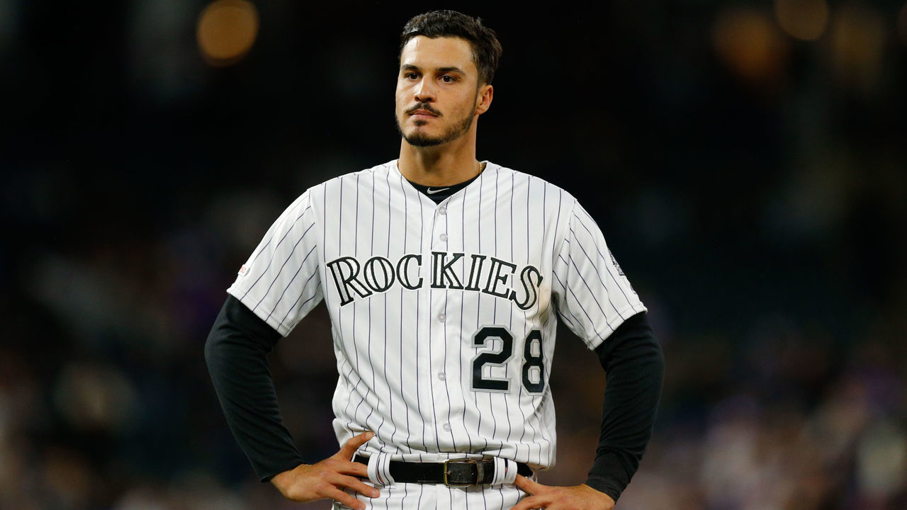 DENVER, CO - APRIL 7: Nolan Arenado #28 of the Colorado Rockies stands on the field after being stranded at third base in the fifth inning against the Los Angeles Dodgers at Coors Field on April 7, 2019 in Denver, Colorado. The Dodgers defeated the Rockies 12-6 to sweep the three game series.