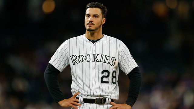 DENVER, CO - APRIL 7: Nolan Arenado #28 of the Colorado Rockies stands on the field after being stranded at third base in the fifth inning against the Los Angeles Dodgers at Coors Field on April 7, 2019 in Denver, Colorado. The Dodgers defeated the Rockies 12-6 to sweep the three game series.