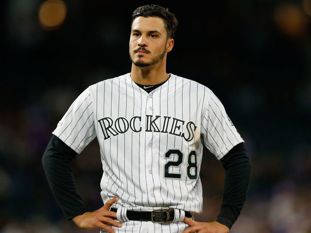 DENVER, CO - APRIL 7: Nolan Arenado #28 of the Colorado Rockies stands on the field after being stranded at third base in the fifth inning against the Los Angeles Dodgers at Coors Field on April 7, 2019 in Denver, Colorado. The Dodgers defeated the Rockies 12-6 to sweep the three game series.